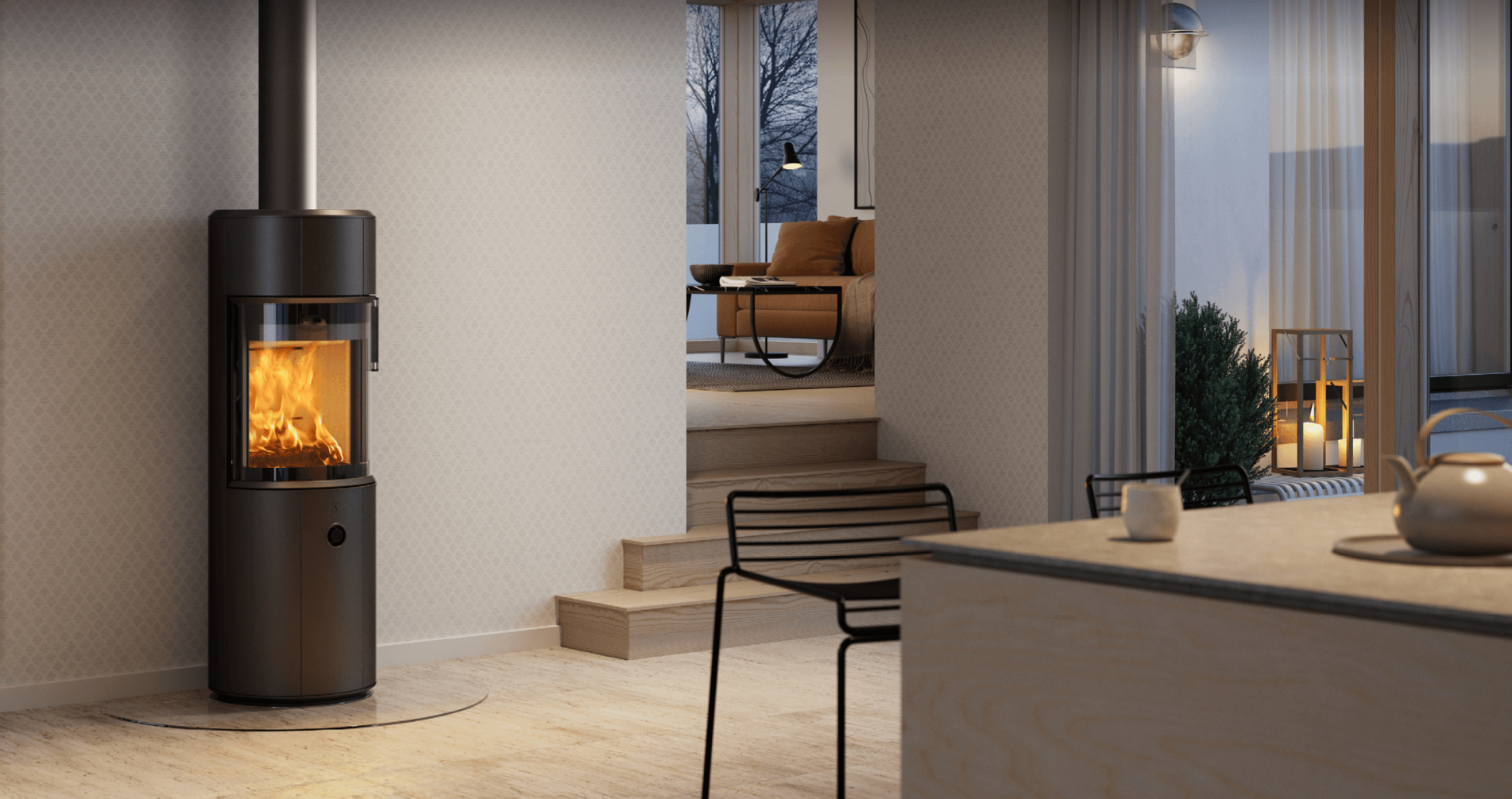 Zwarte ronde houtkachel Scan 67-1300 in een licht Scandinavisch keukeninterieur